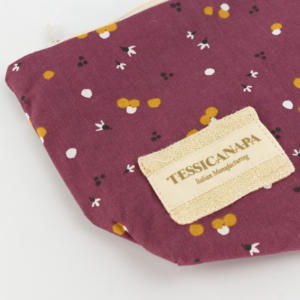 dettaglio mini pochette in cotone e canapa punti di colore