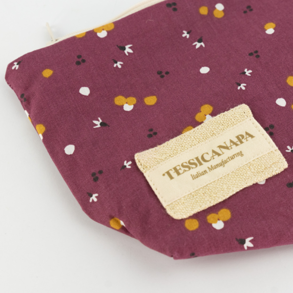 dettaglio mini pochette in cotone e canapa punti di colore